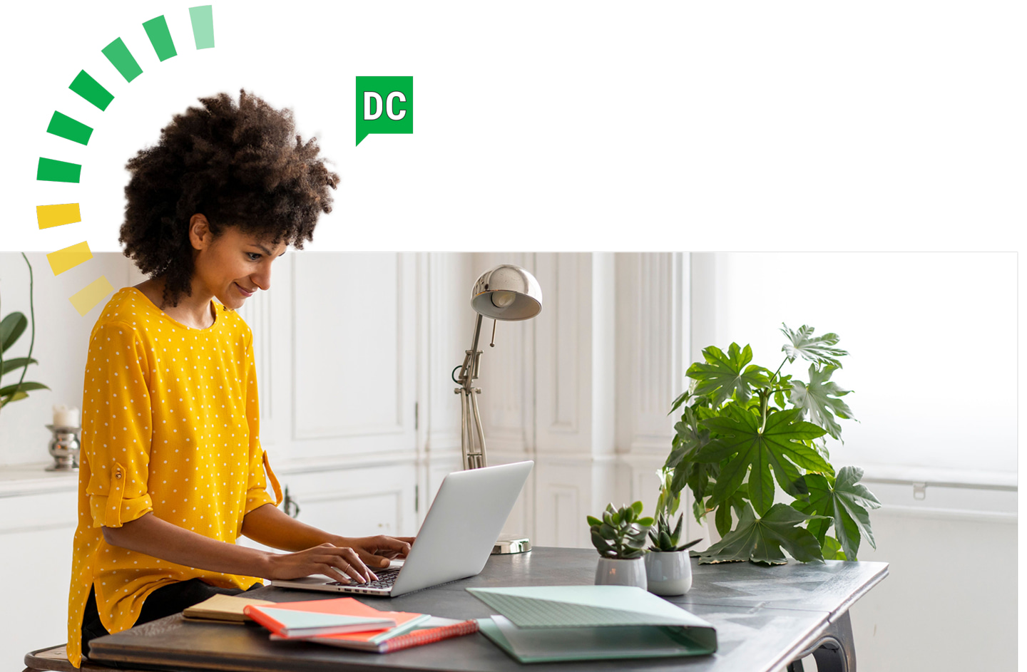 Woman working on a laptop with a DC DiSC style halo.